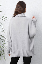 Light gray oversized ribbed turtleneck sweater with long sleeves