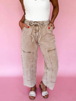 Beige acid wash wide leg high-waisted jeans with drawstring and patch pockets