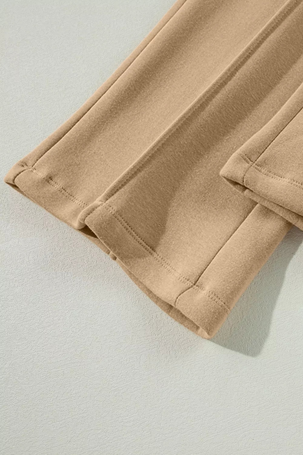 Daverri Wide Leg Drawstring Pants in beige stretchy fabric with stitched hems