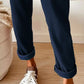 Dark blue Daverri Fashions corduroy pants with rolled cuffs