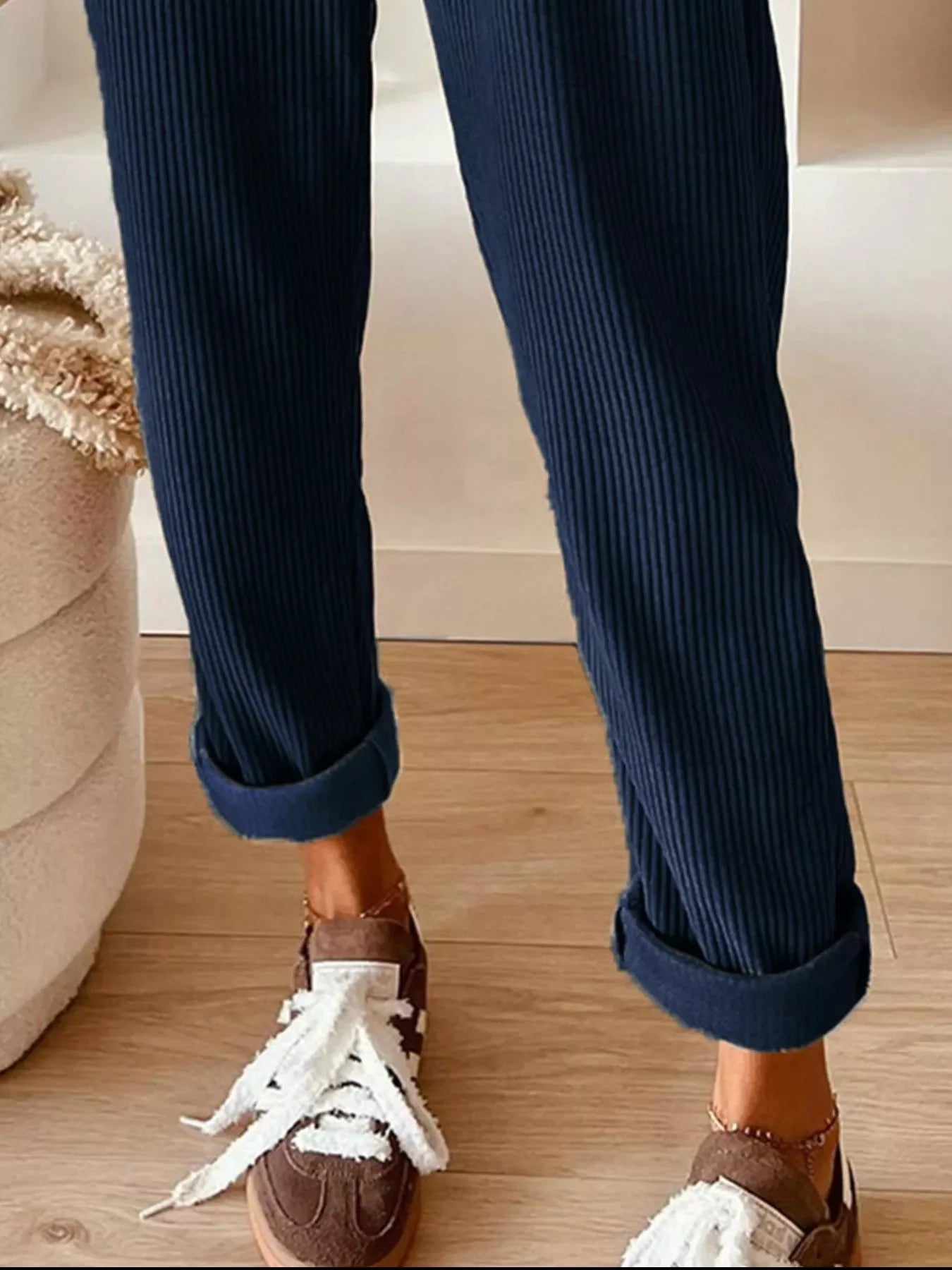 Dark blue Daverri Fashions corduroy pants with rolled cuffs