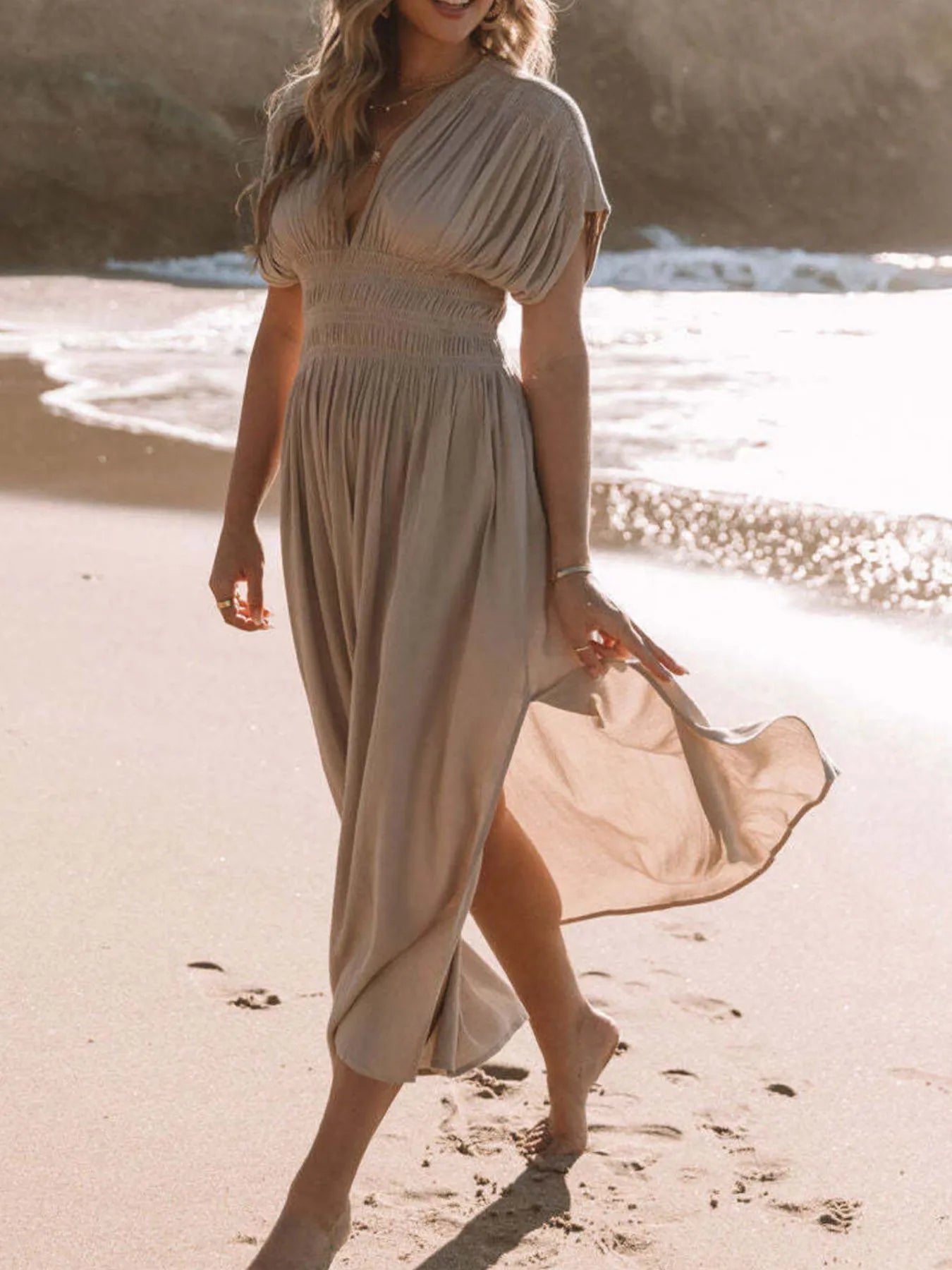 Beige flowy plus size deep V-neck maxi dress with side slit by Daverri Fashions