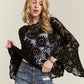 ADORA Bell Sleeve Crochet Top in black lace with floral patterns