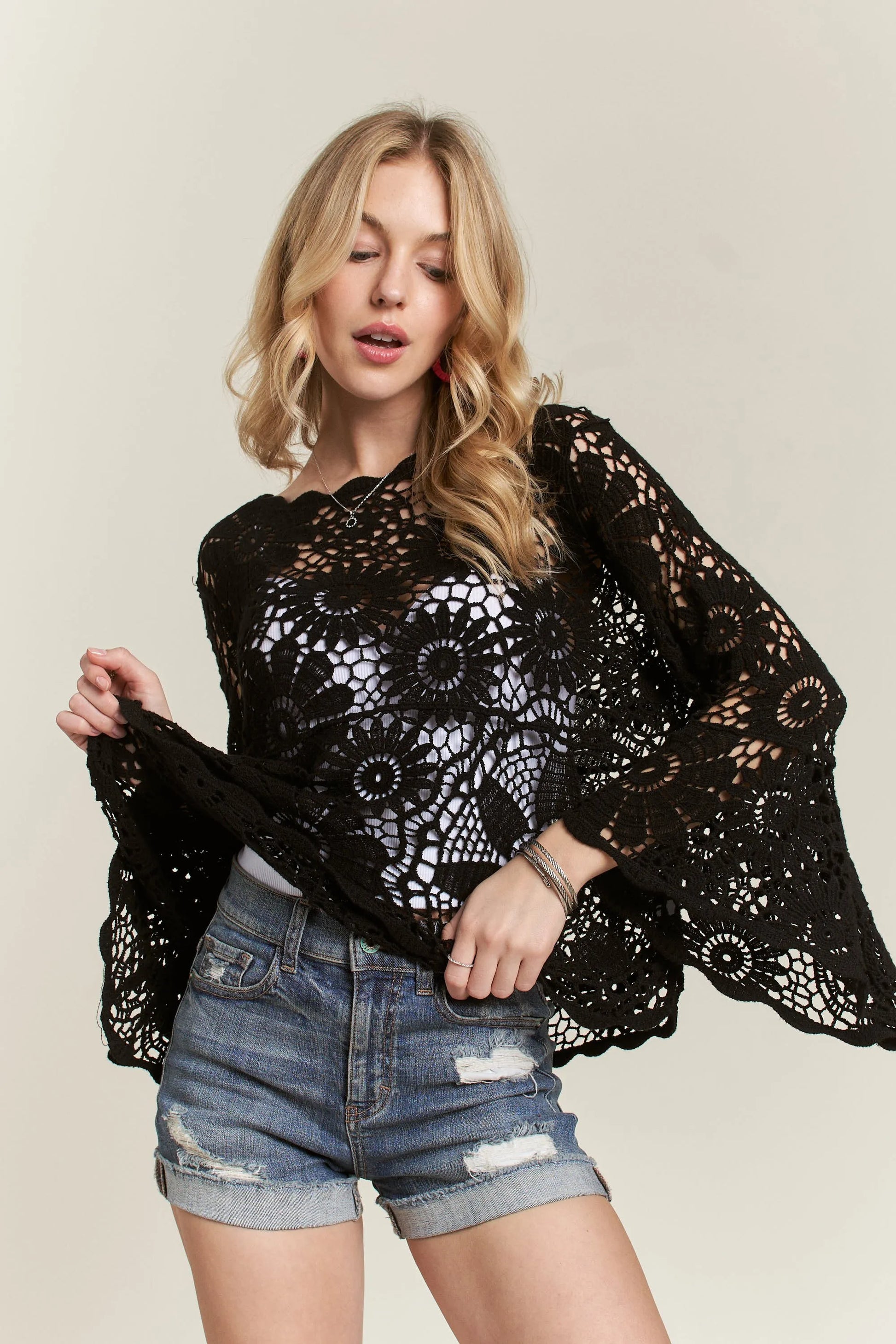 ADORA Bell Sleeve Crochet Top in black lace with floral patterns
