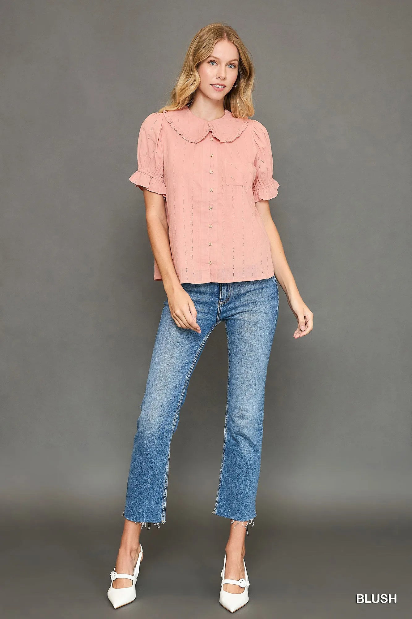 Soft blush pink Peter Pan collared blouse with ruffled sleeves