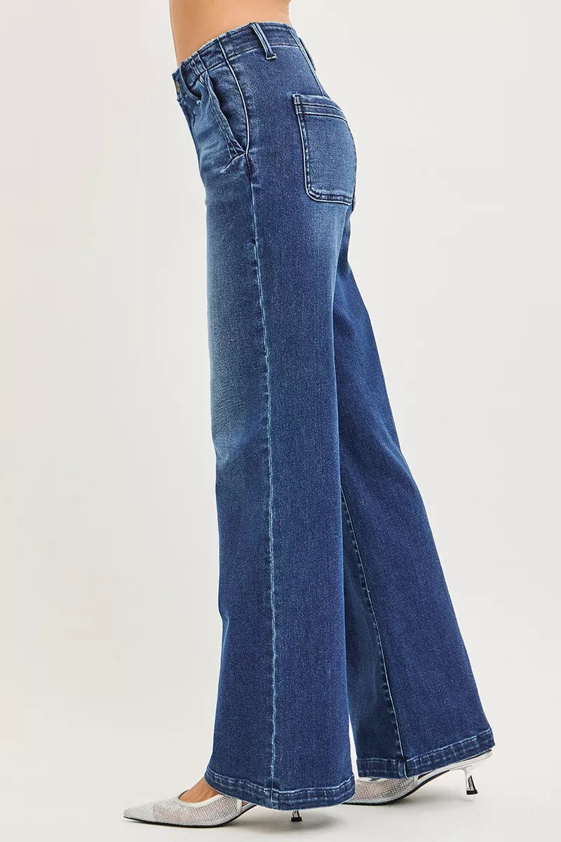 RISEN high-rise wide-leg denim flare jeans with slanted pockets