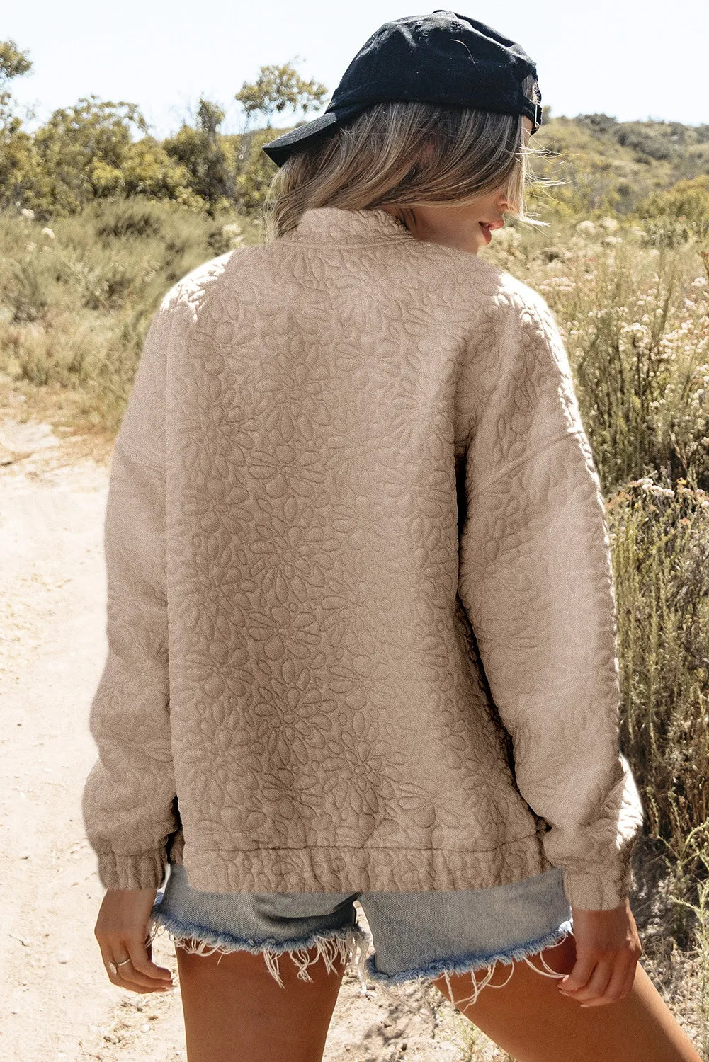 Women’s beige floral quilted jacket with baseball collar and ribbed cuffs