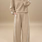 Beige women’s crewneck tracksuit with white stripes and ribbed cuffs