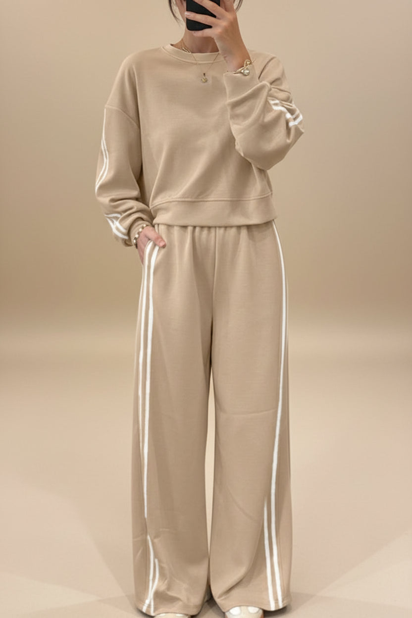 Beige women’s crewneck tracksuit with white stripes and ribbed cuffs