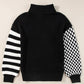 Striped and checkered turtleneck dropped shoulder sweater in black