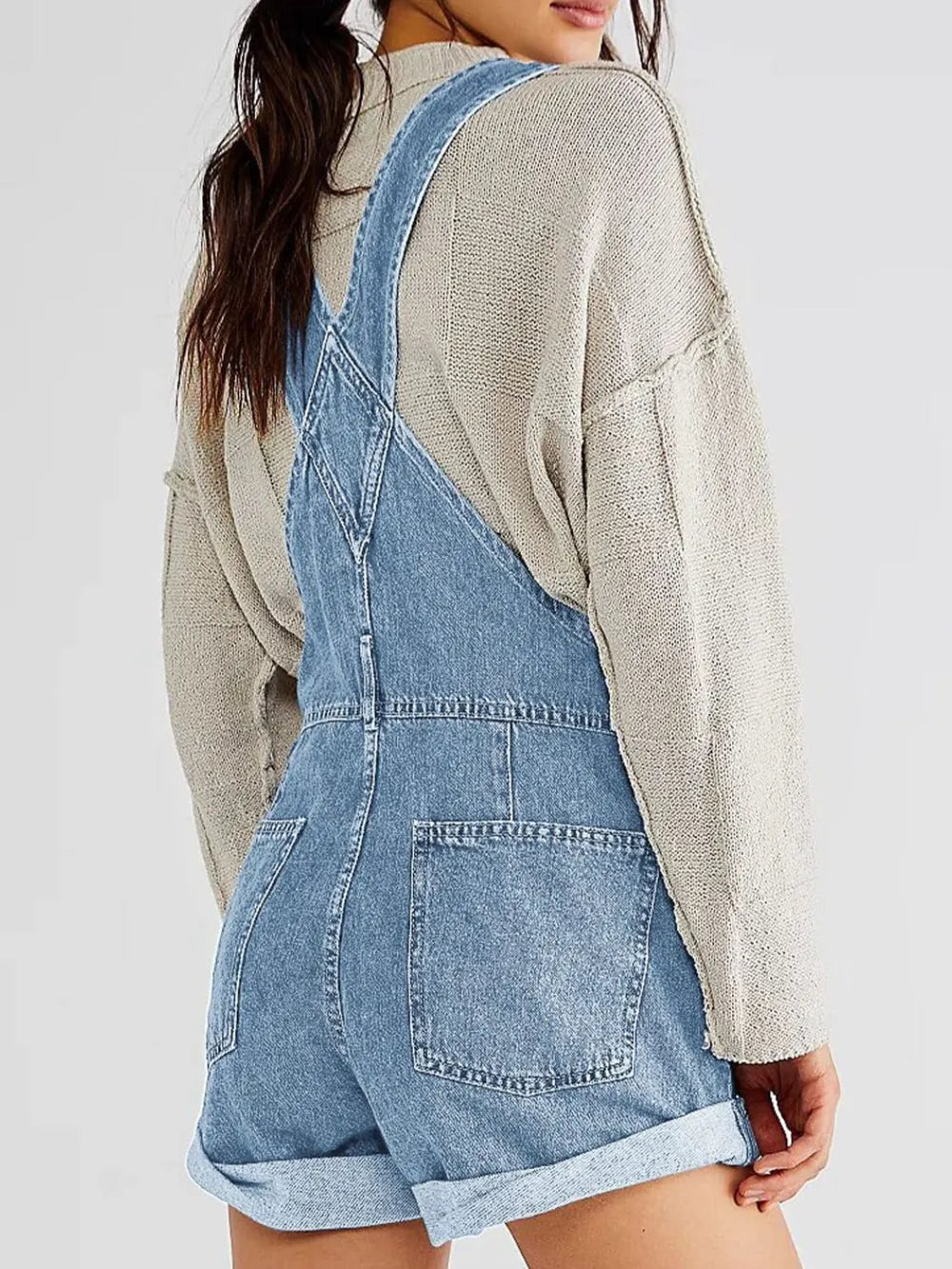 Light-wash pocketed square neck wide strap denim overalls with rolled cuffs