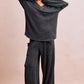 BiBi two-tone cord rib V-neck top and wide-leg pants set in dark gray knit
