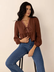 Peplum Tied V-Neck Long Sleeve Blouse | Blouses Daverri Fashions
