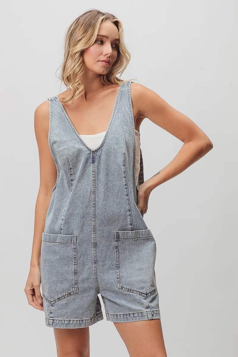 BiBi Patch vintage washed denim shortall with light-wash overall shorts, V-neck, and front pockets
