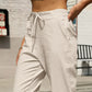Beige high-waisted Daverri Fashions tapered jogger pants with drawstring
