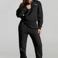 Daverri black zip-front sweatshirt with beige chest patch, front view
