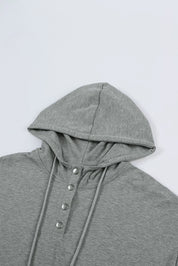 Gray drawstring quarter snap cap sleeve hoodie with silver buttons