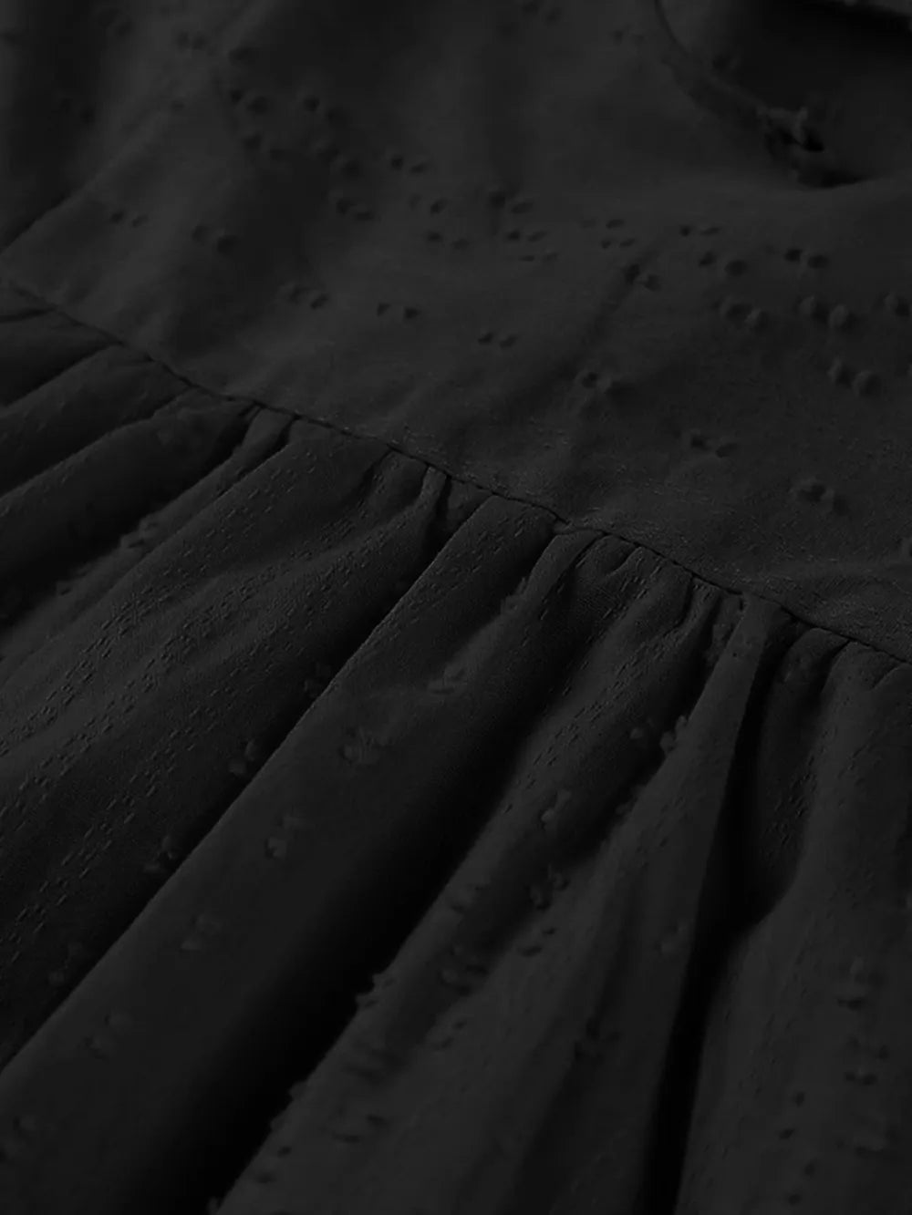 Full size tied three-quarter sleeve mini dress with black eyelet embroidery and gathered waist