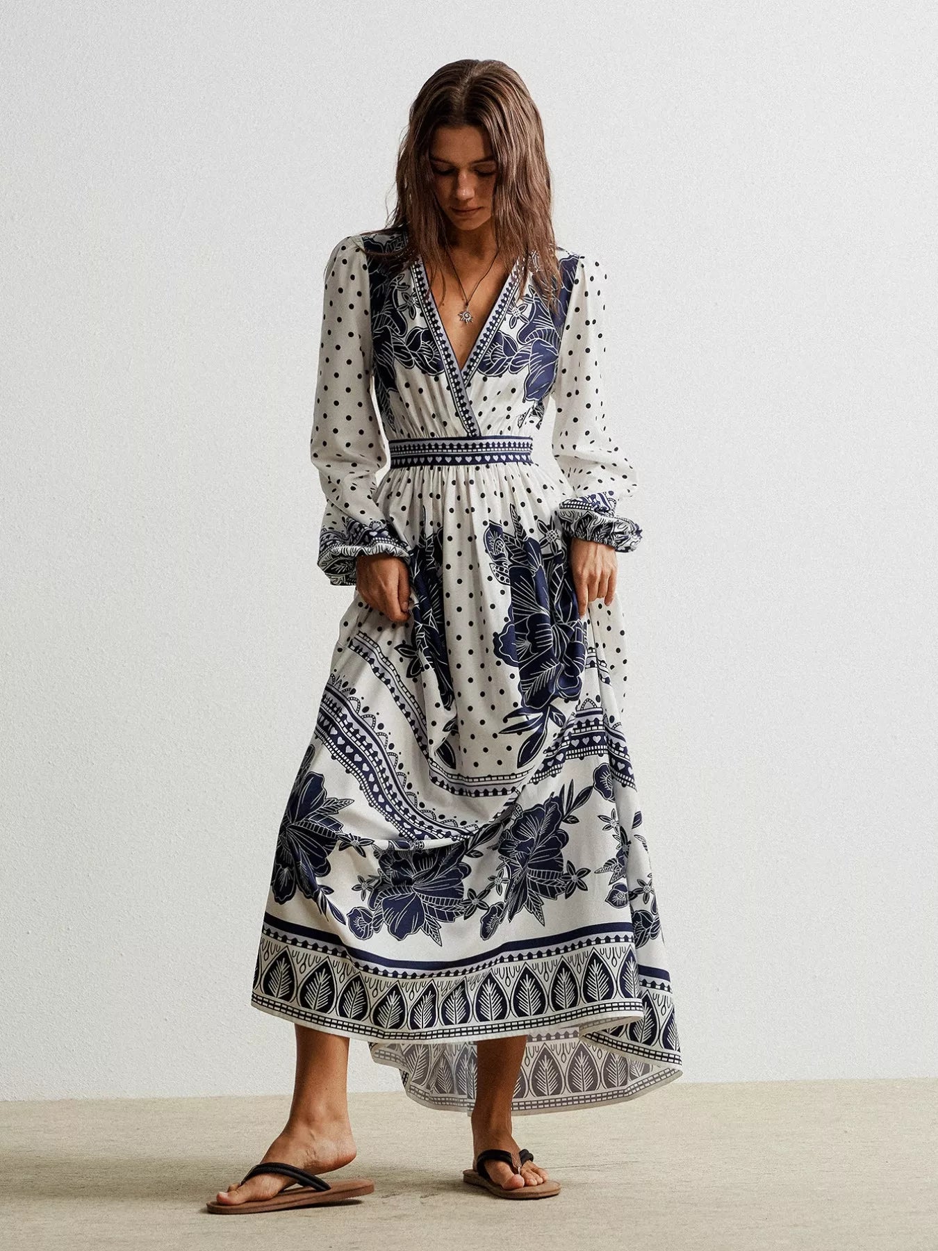Floral print long sleeve maxi dress with navy blue patterns