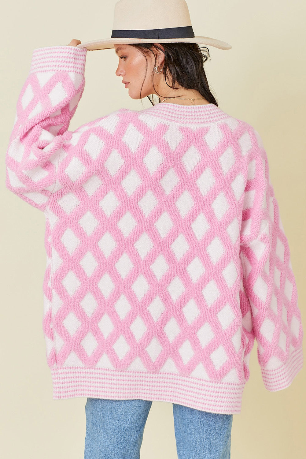 Pink rhombus pattern open front pocketed knit cardigan sweater