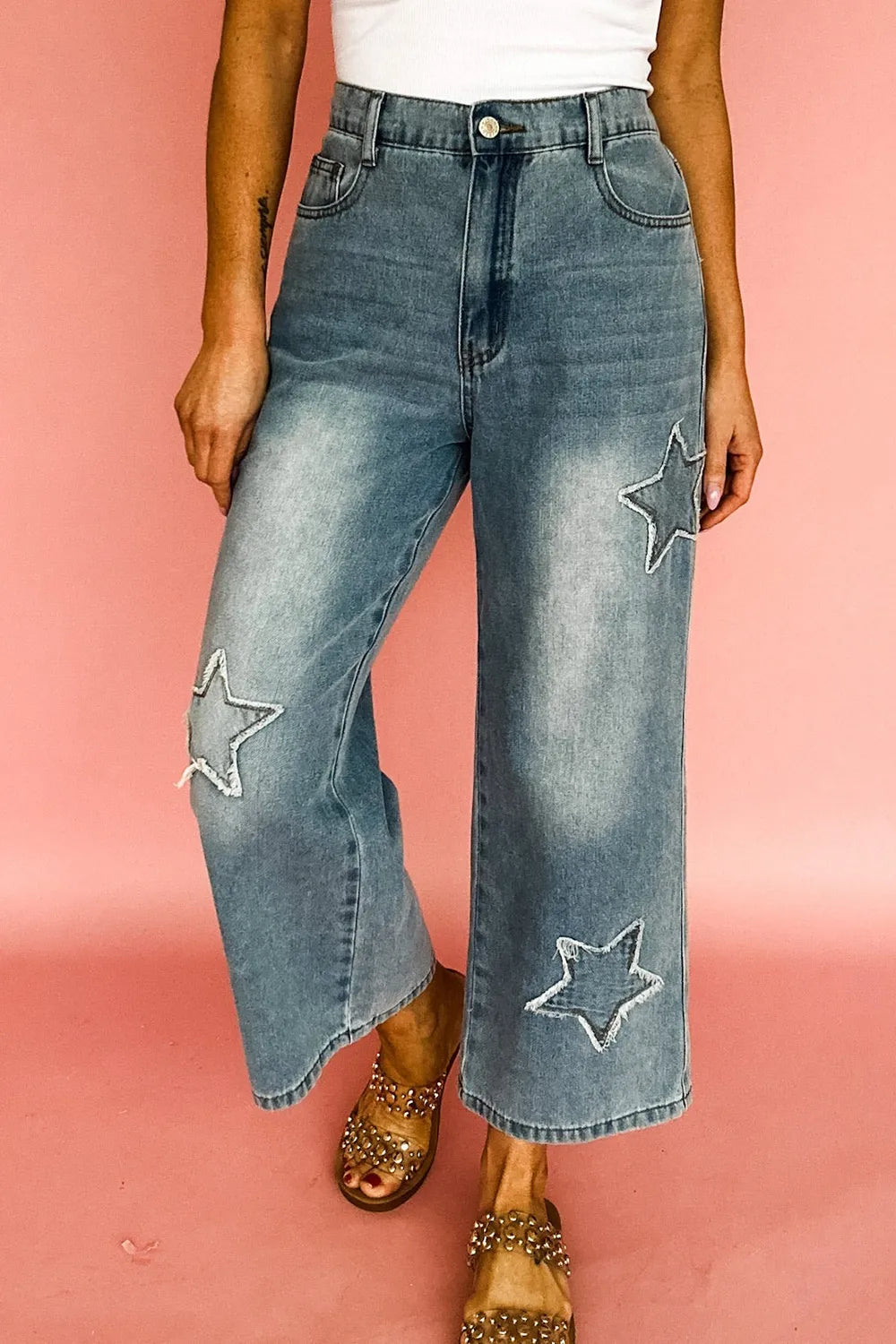 Star embroidered high waist wide leg light-wash denim jeans