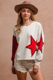 BiBi Star Patch And Spliced Hemline French Terry Long Sleeve Sweatshirt | Daverri Fashions