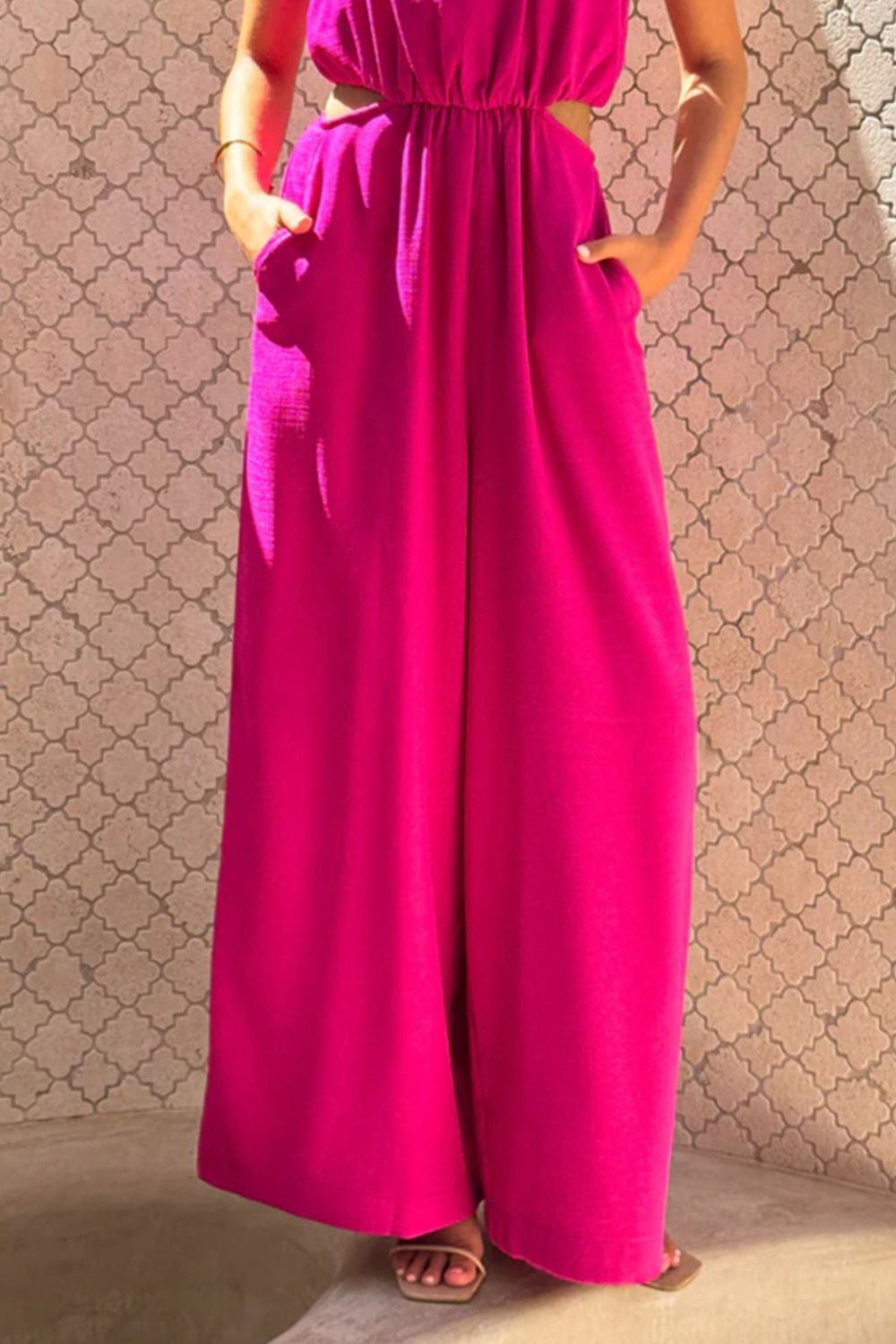 Vibrant fuchsia Cutout Sleeveless Wide Leg Jumpsuit with cut-out waistband