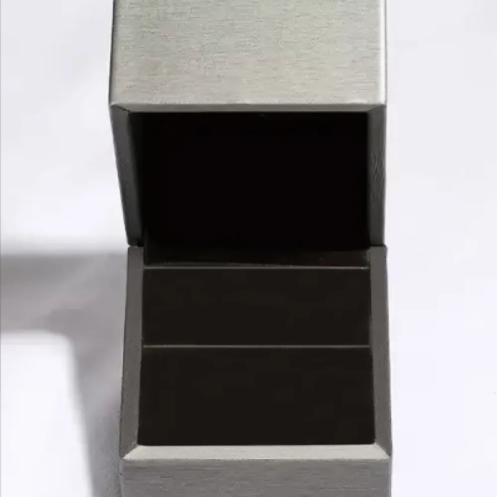 A dark grey jewelry box