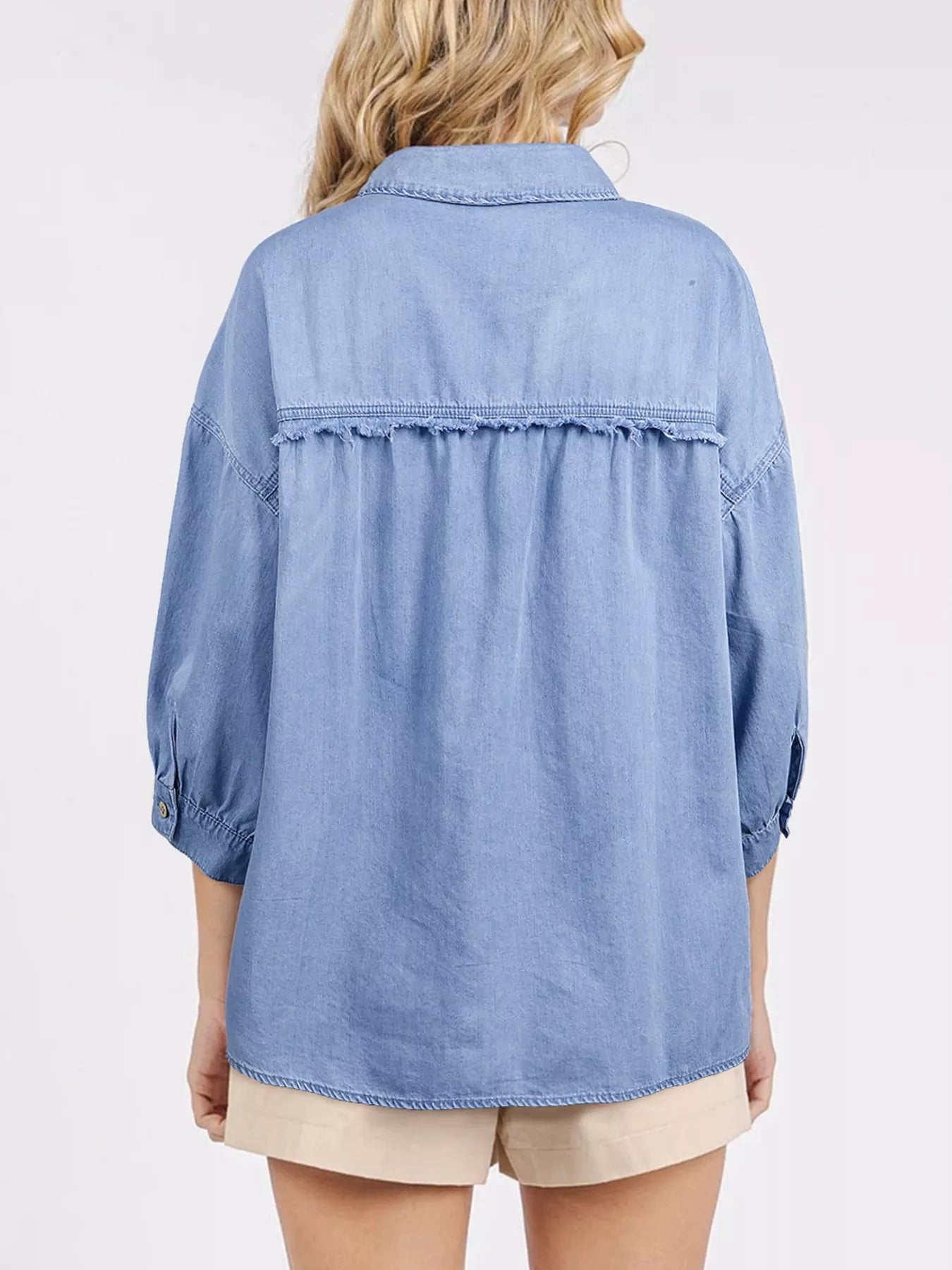 Daverri Fashions light blue denim women’s casual button-up shirt with frayed hems