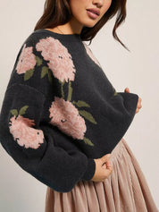 Black floral boat neck long sleeve sweater with pink flowers