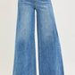 RISEN High Rise Ankle Wide Jeans in blue denim with frayed hem