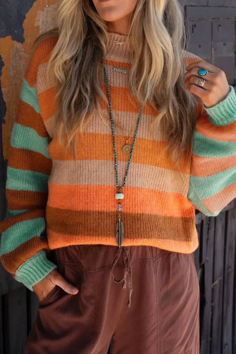 Cozy striped rainbow long sleeve knit sweater in orange and mint green