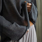 Soft dark gray boat neck dropped shoulder knitted sweater