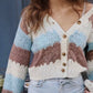Cozy color block button-up cardigan in soft blue, beige, and brown stripes