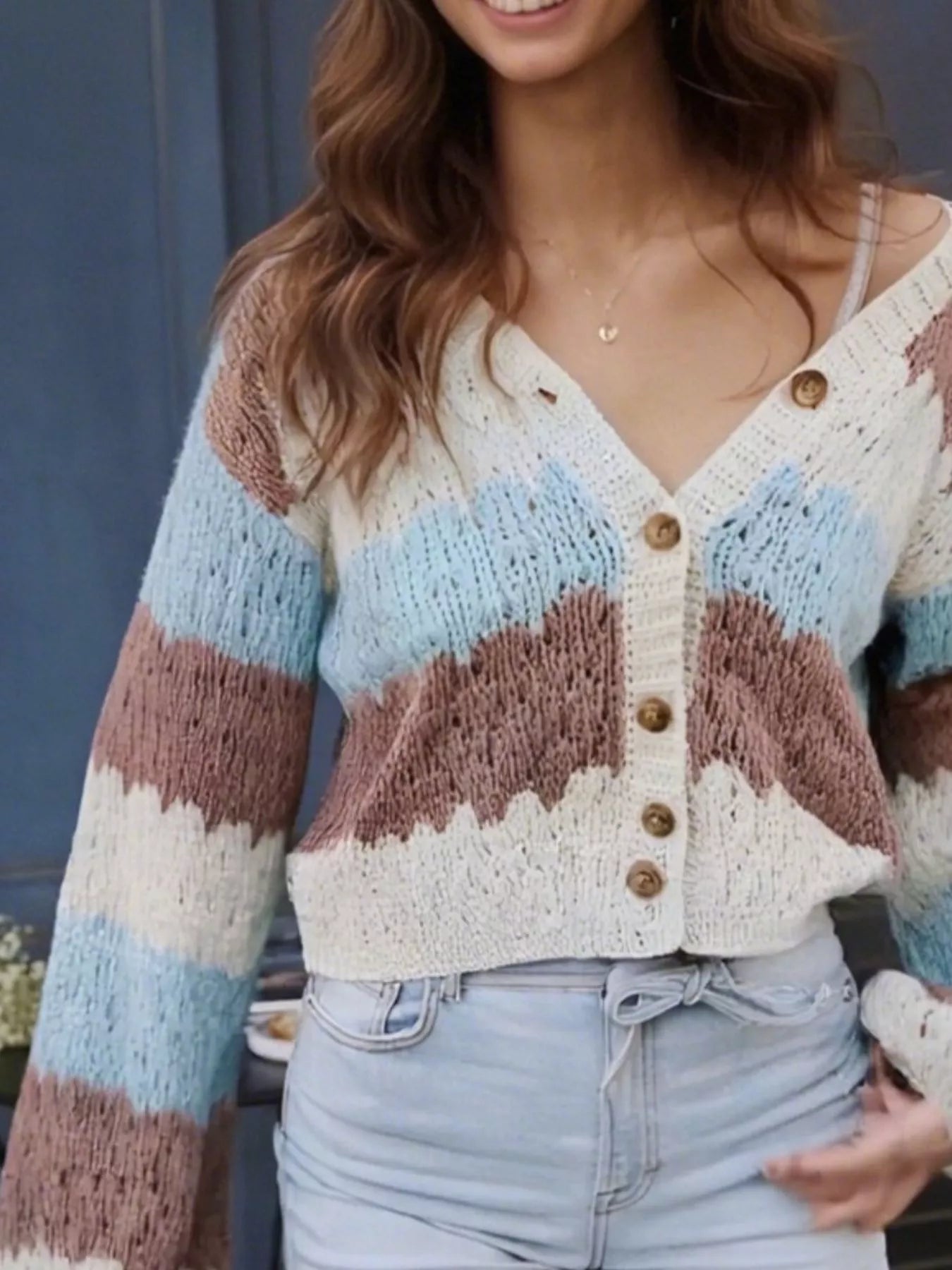 Cozy color block button-up cardigan in soft blue, beige, and brown stripes