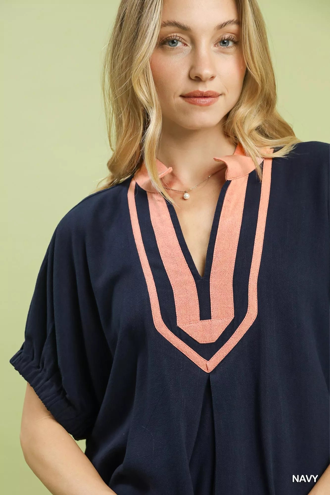 Umgee navy blue linen V-neck blouse with peach trim