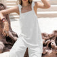 White sleeveless wide leg jumpsuit with tie shoulder straps