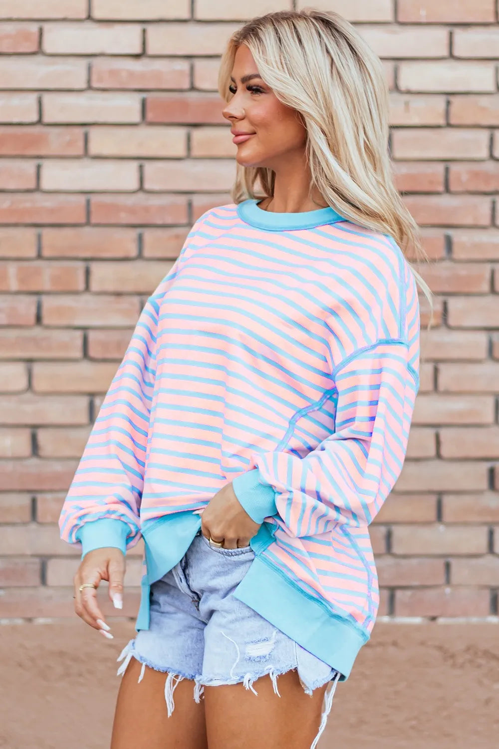 Pastel pink and light blue striped high-low oversized sweatshirt