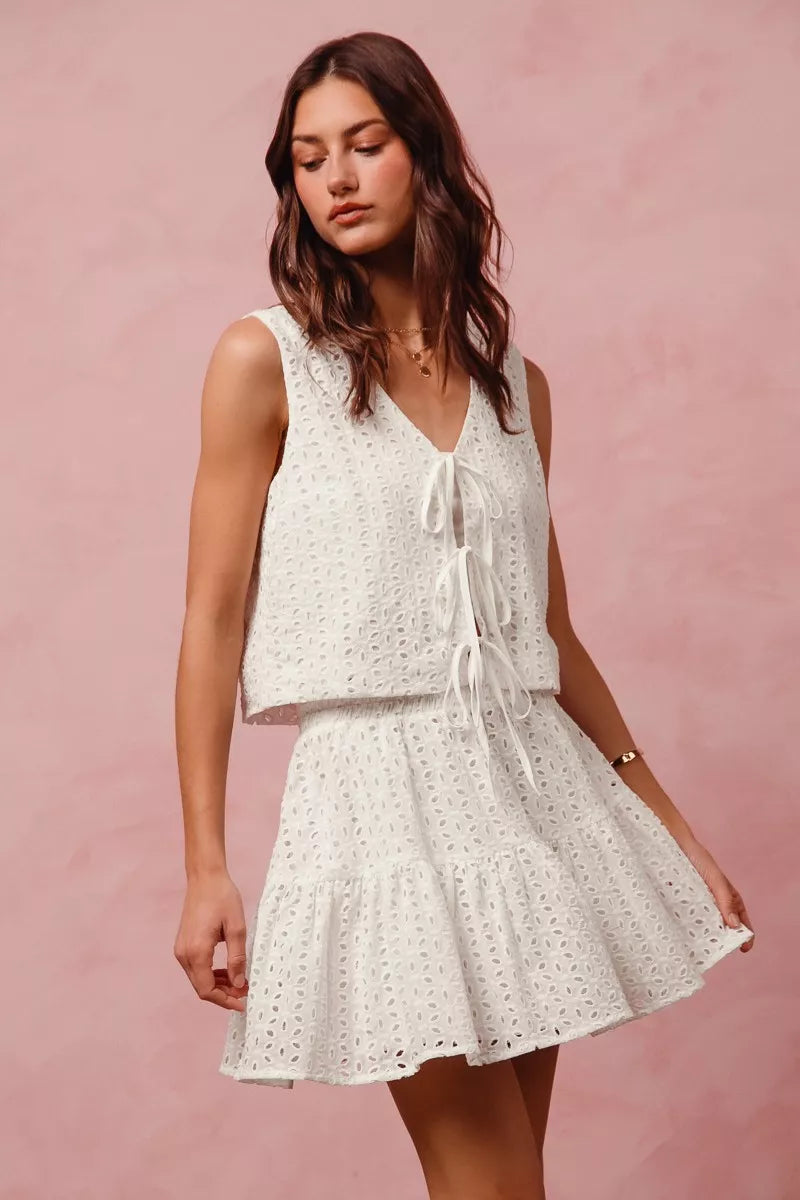 White eyelet lace sleeveless SO ME vest top with V-neck tied front
