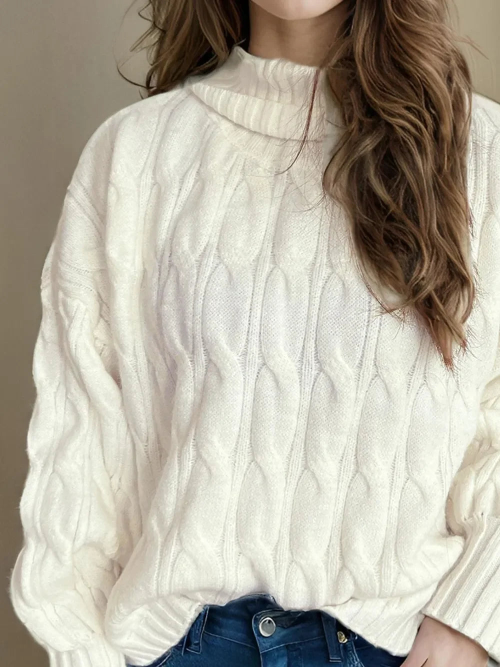 Cream cable-knit turtleneck sweater with balloon sleeves