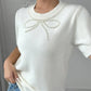 Pearl Bow Embellished Round Neck Sweater - DAVERRI FASHIONS