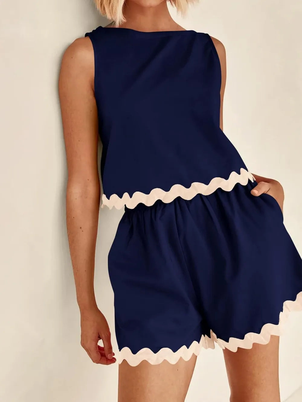 Daverri Fashions navy blue sleeveless top and shorts set with cream trim