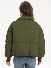 Olive green zip-up turtleneck puffer jacket with long sleeves