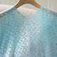 Delicate light blue Daverri openwork tassel gradient knit lace cover-up top