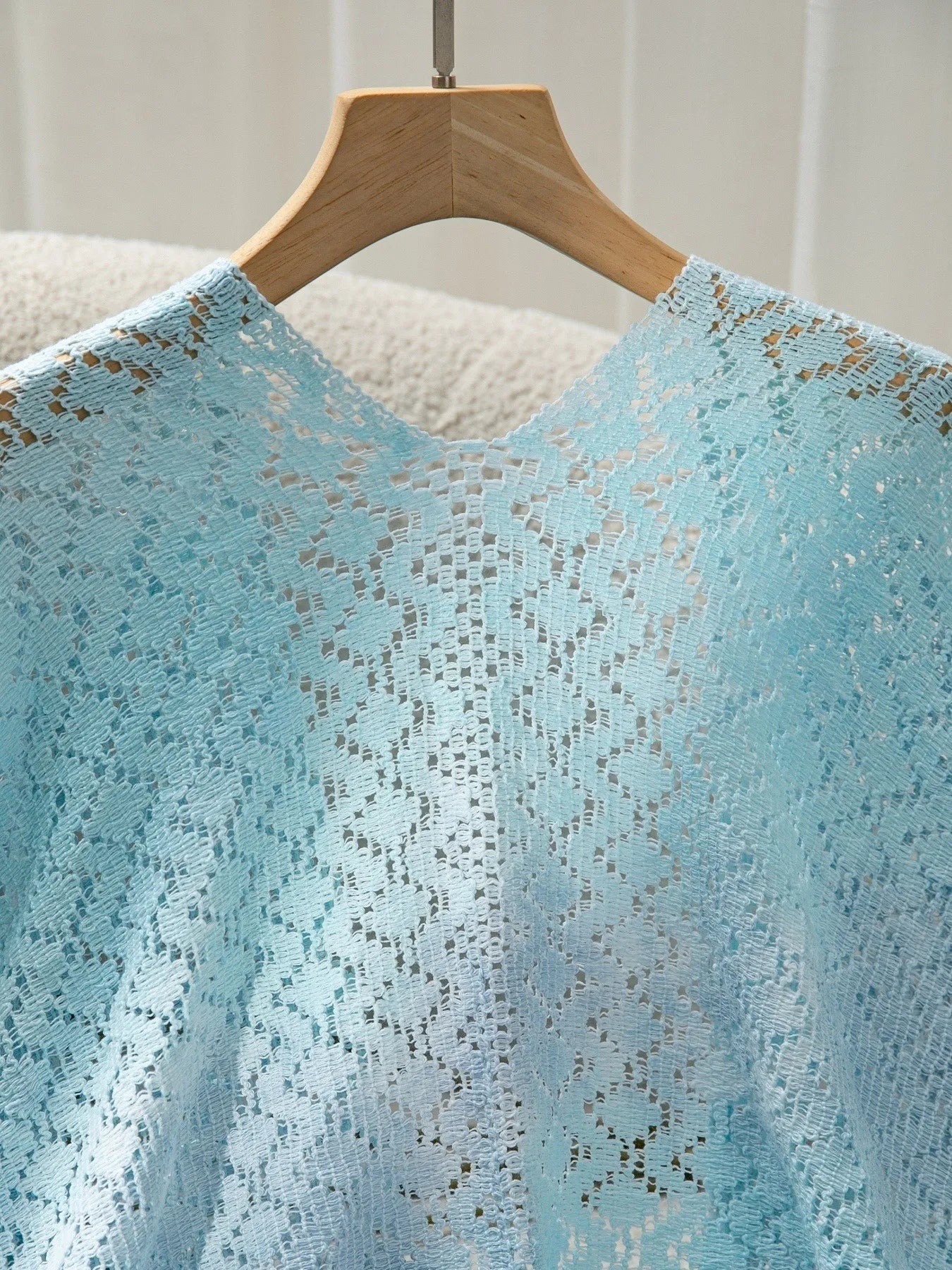 Delicate light blue Daverri openwork tassel gradient knit lace cover-up top