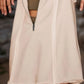 Beige half-zipped hooded sleeveless romper vest dress with frayed hem