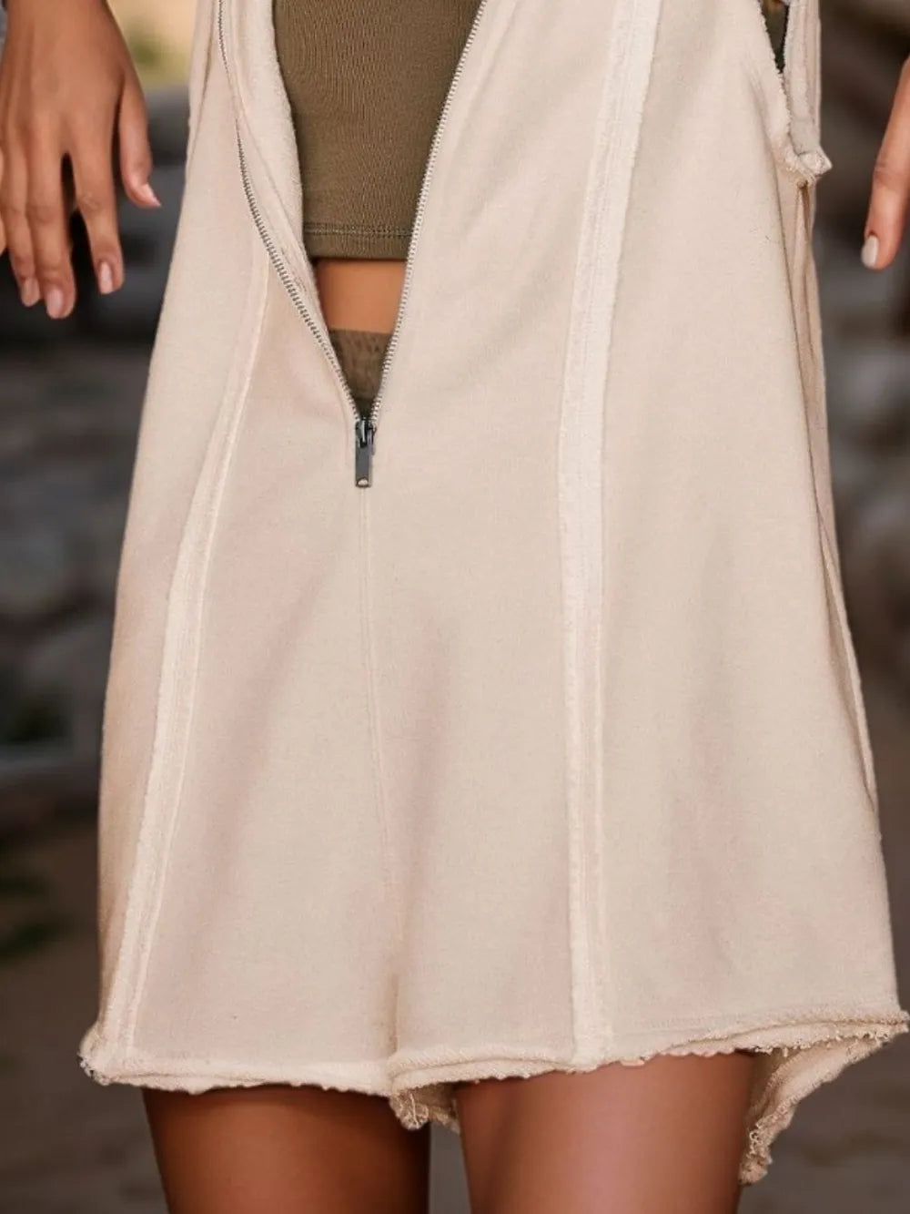 Beige half-zipped hooded sleeveless romper vest dress with frayed hem