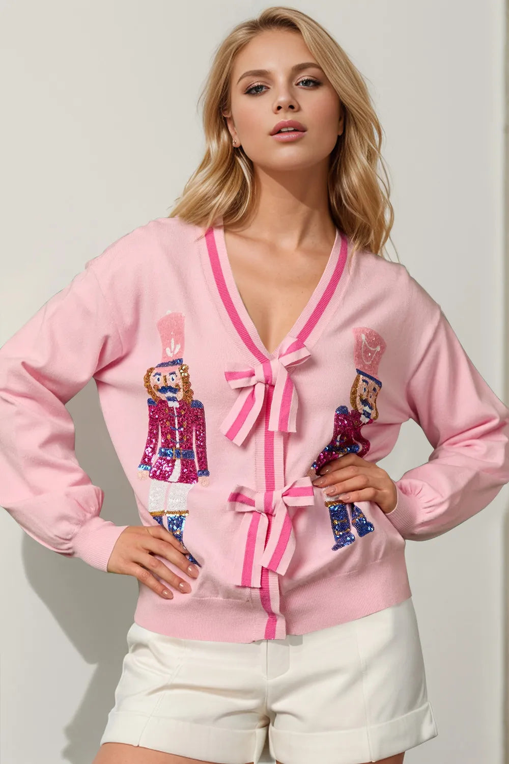 Blush Pink Double Take Full Size Nutcracker Sequin Bow Decor Cardigan | Cardigans Daverri Fashions