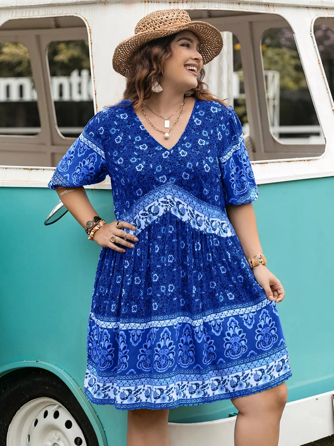 Vibrant blue plus size floral V-neck mini dress with white trim