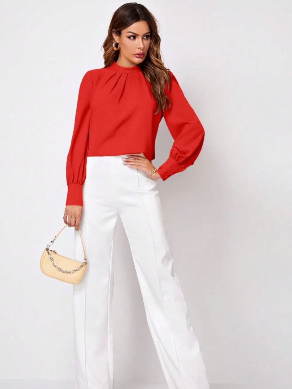 Vibrant red ruched mock neck long-sleeve blouse with puffed sleeves